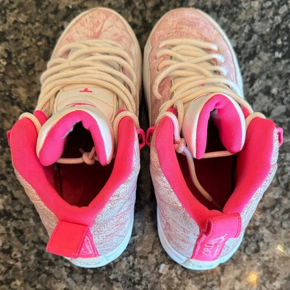 Jordan retro 12 Kids Sneakers in Pink and white 5Y or 7Womens
